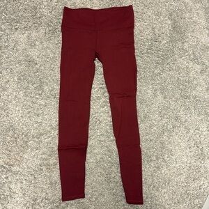 Maroon colored Lululemon leggings 
Size women’s medium